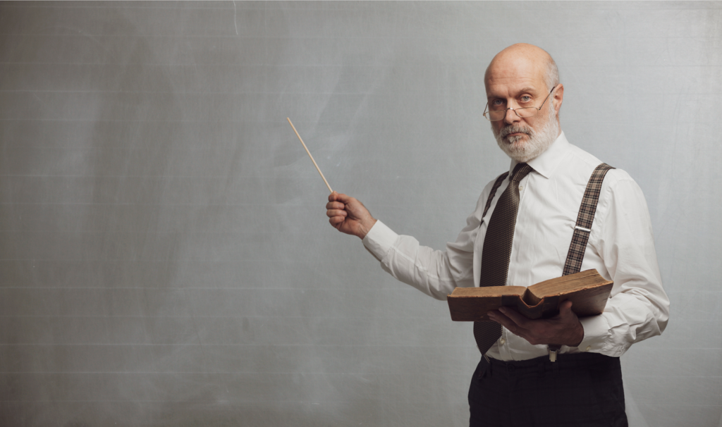 Man pointing at blackboard