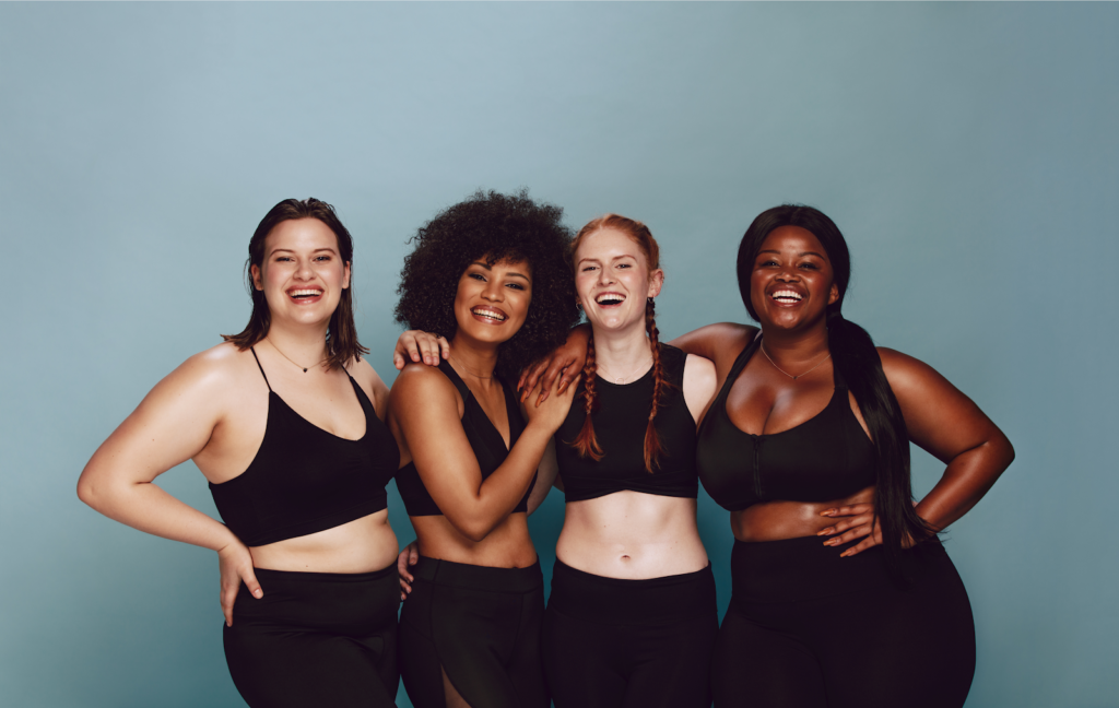 A wide diversity of woman laughing together