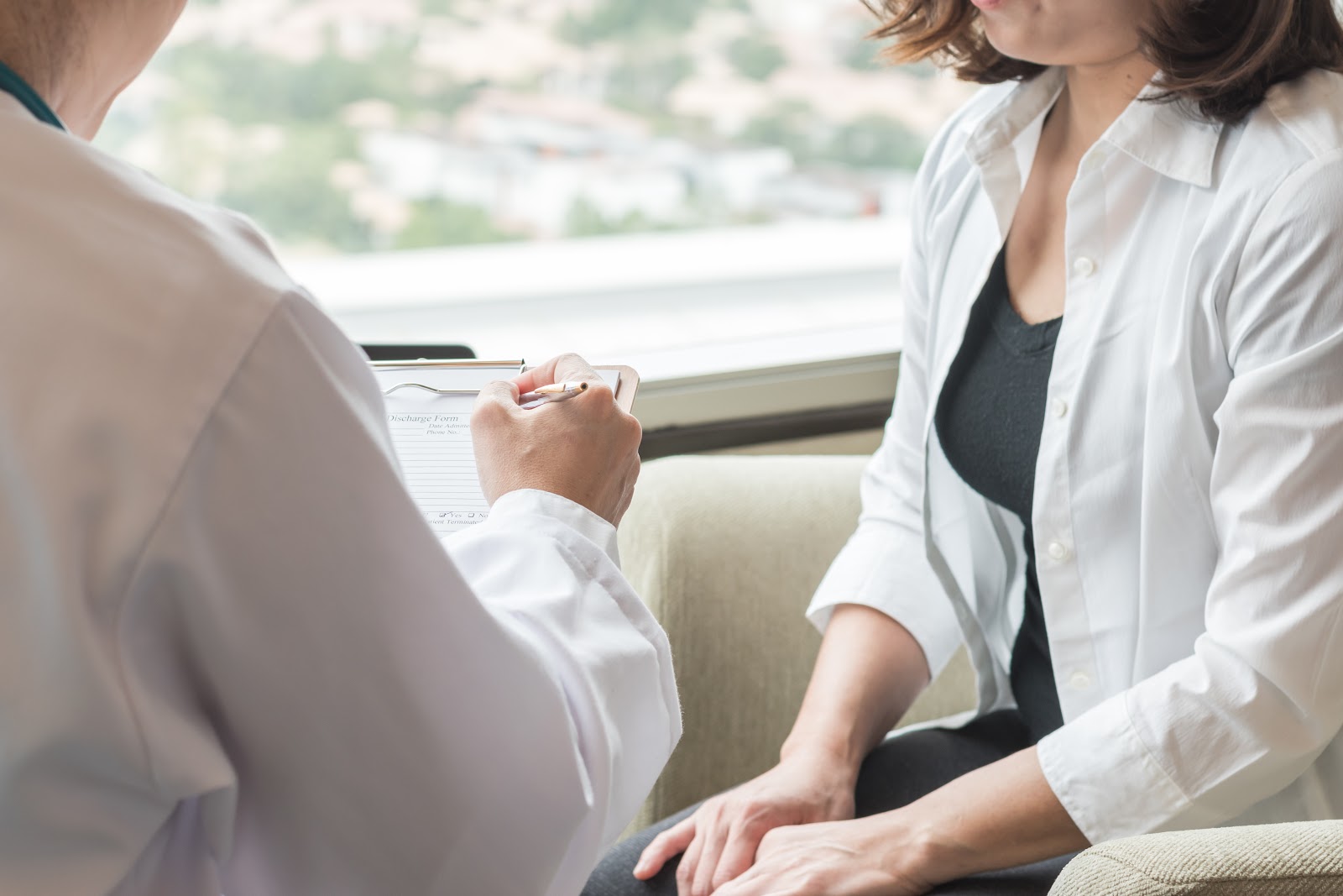 Doctor discussing procedure to Patient